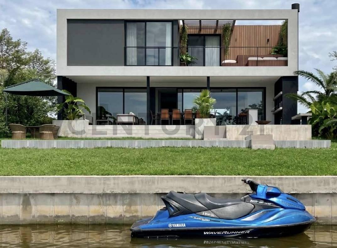 Casa al río en El Canal Villanueva, 3 suites, pileta, y posibilidad de amarra privada — foto 1