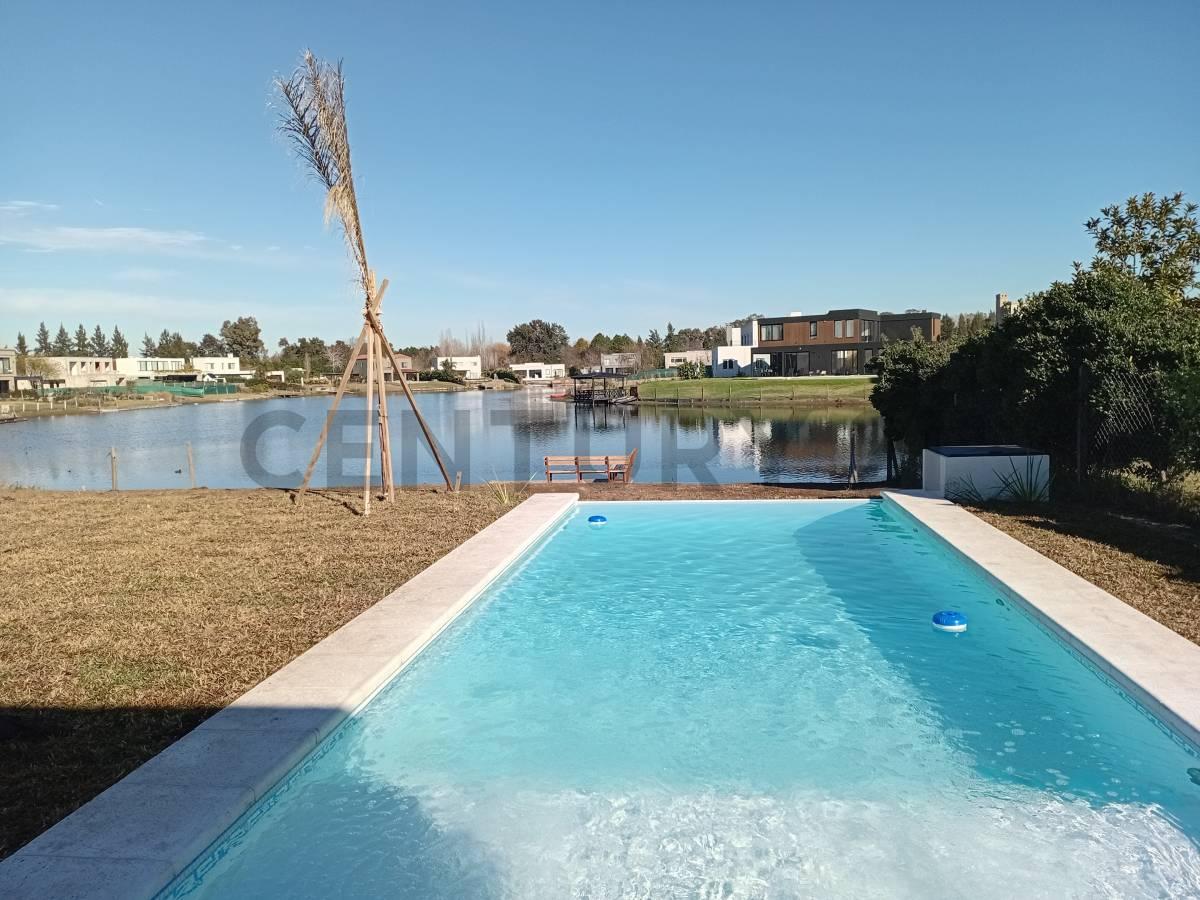 Casa en venta de 5 ambientes a la laguna en una planta en Barrio San Matias puertos Canton Escobar — foto 1